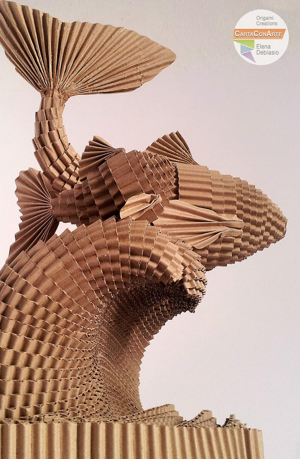 Due pesci sulla cresta dell'onda